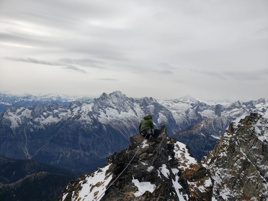 Black peak summit ridge climber