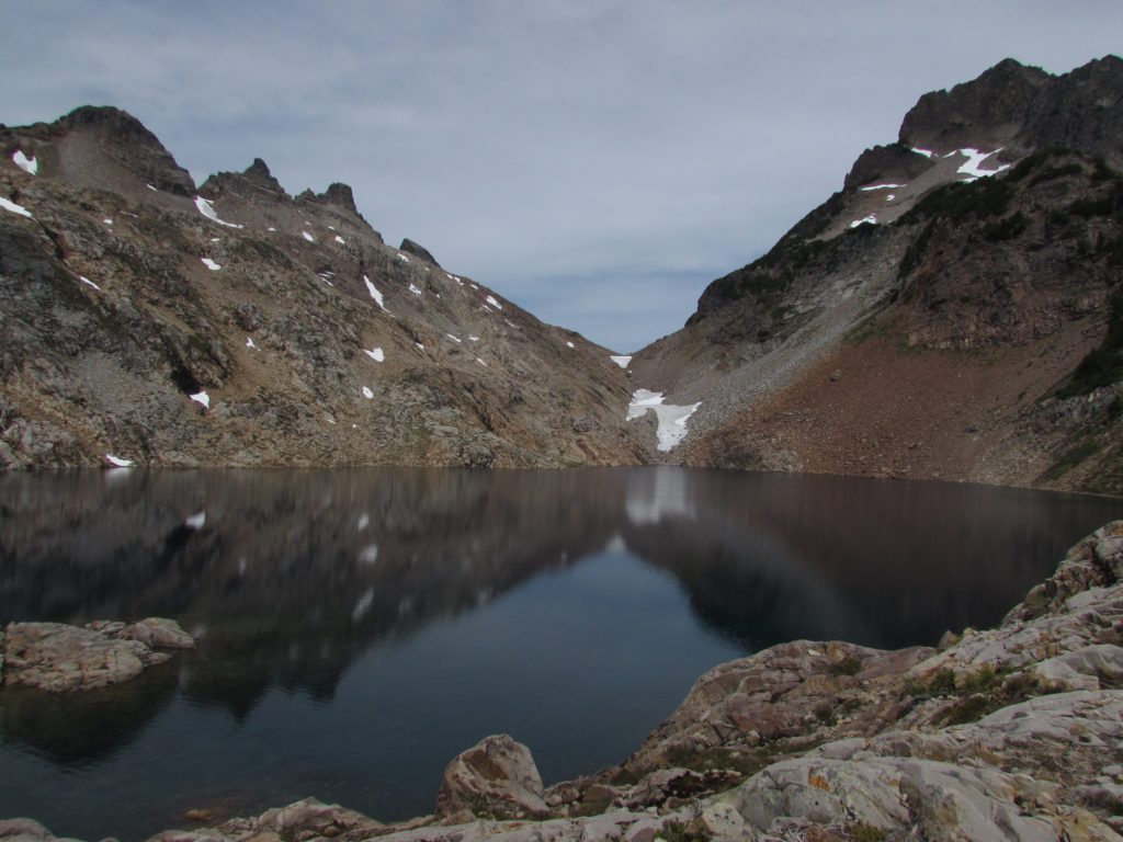 gothic peak and del campo over foggy lake