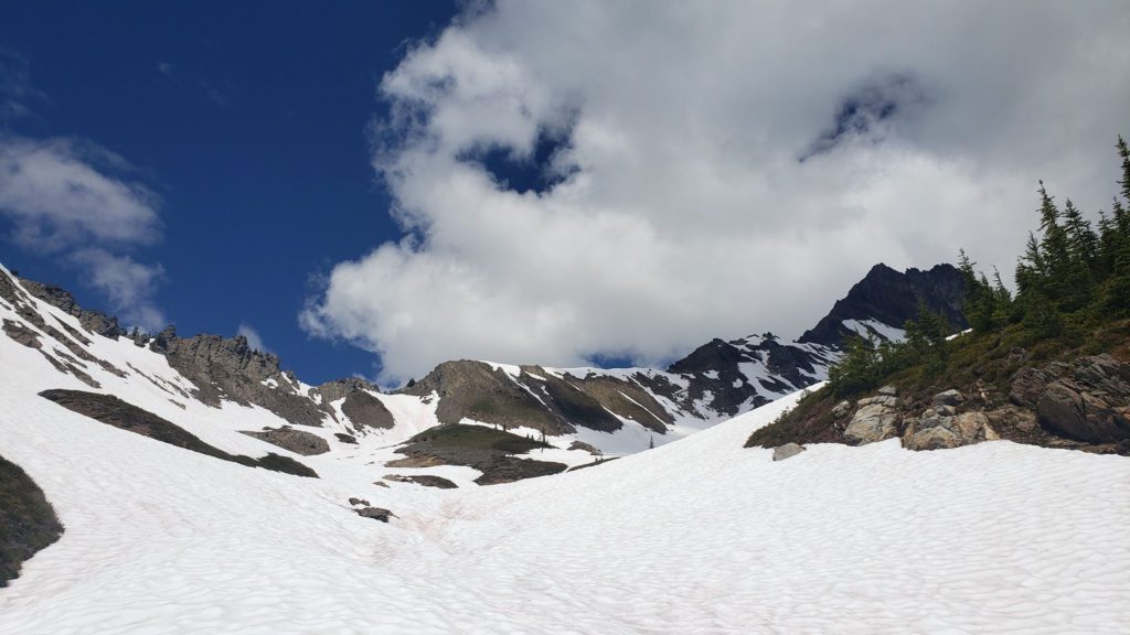snow field above boulder basin trail