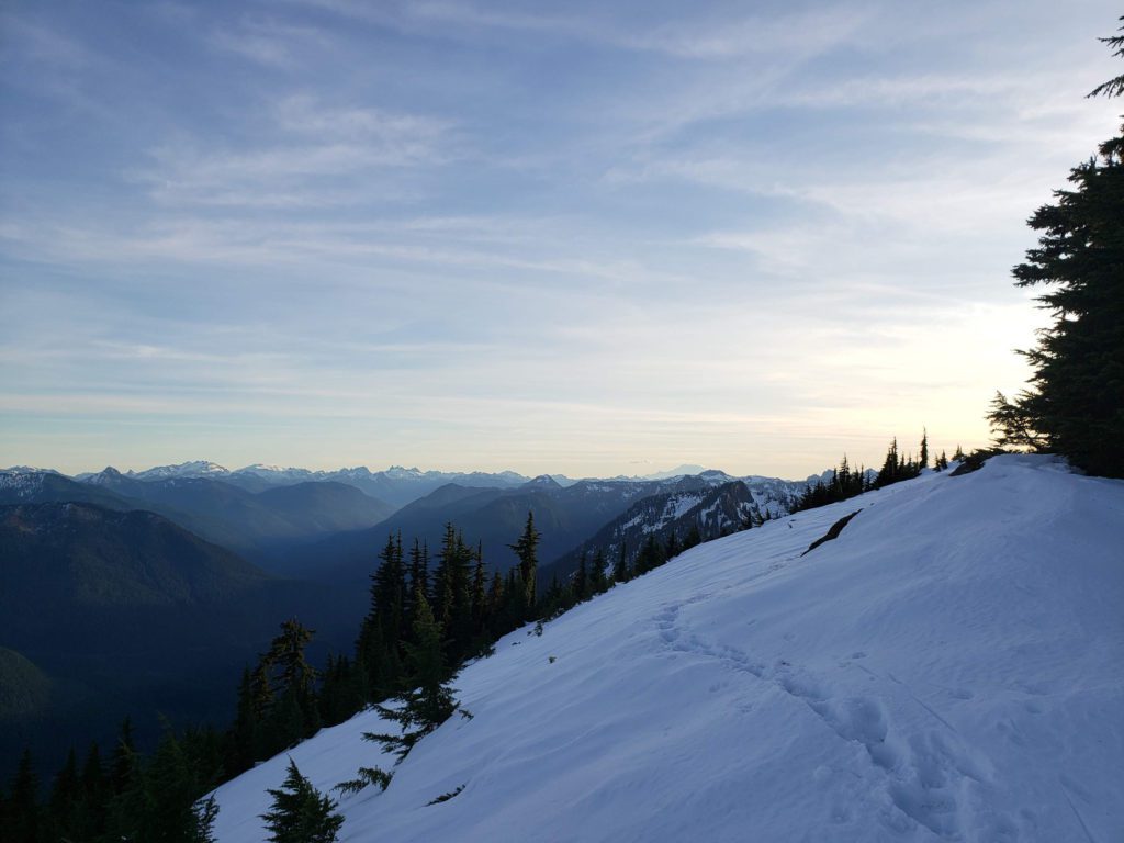 snowy ridgeline traverse along kyes peak climbing route