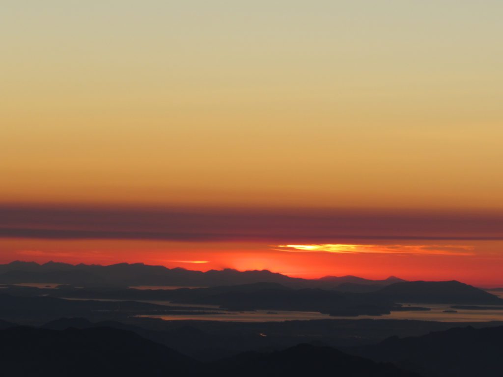 sunset over the olympic mountains from three fingers lookout