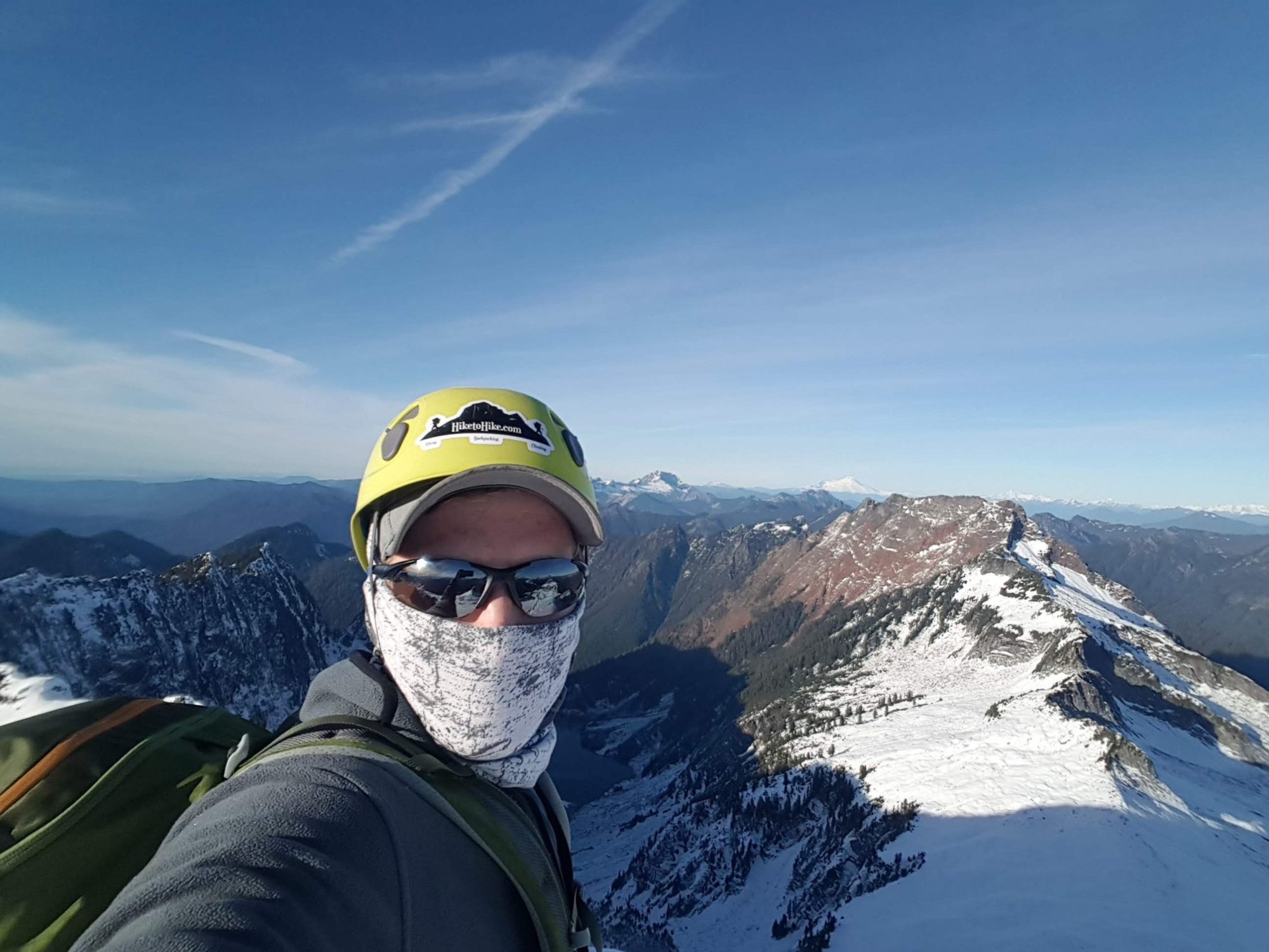 waterboy on the summit of vesper peak in winter