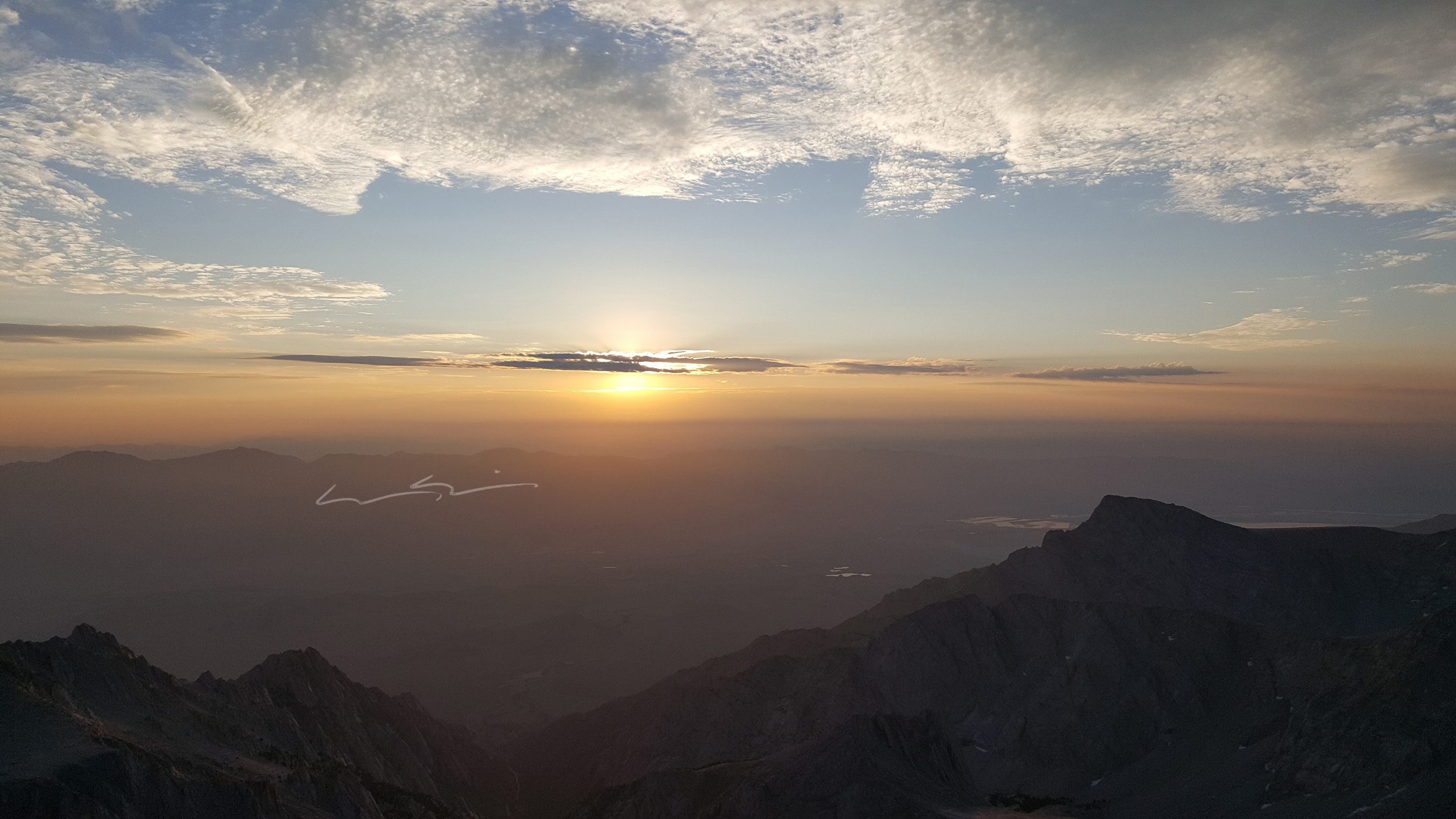 sunrise from the summit of mount whitney in california