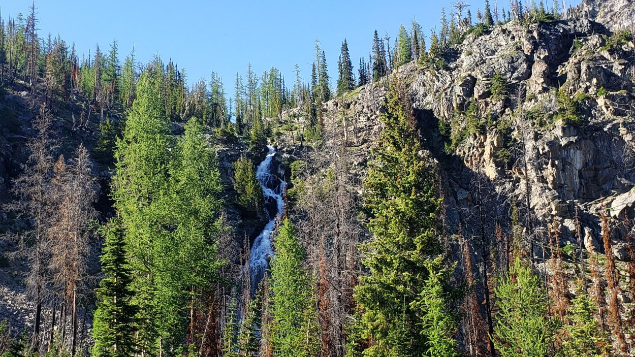 waterfall below scatter lake