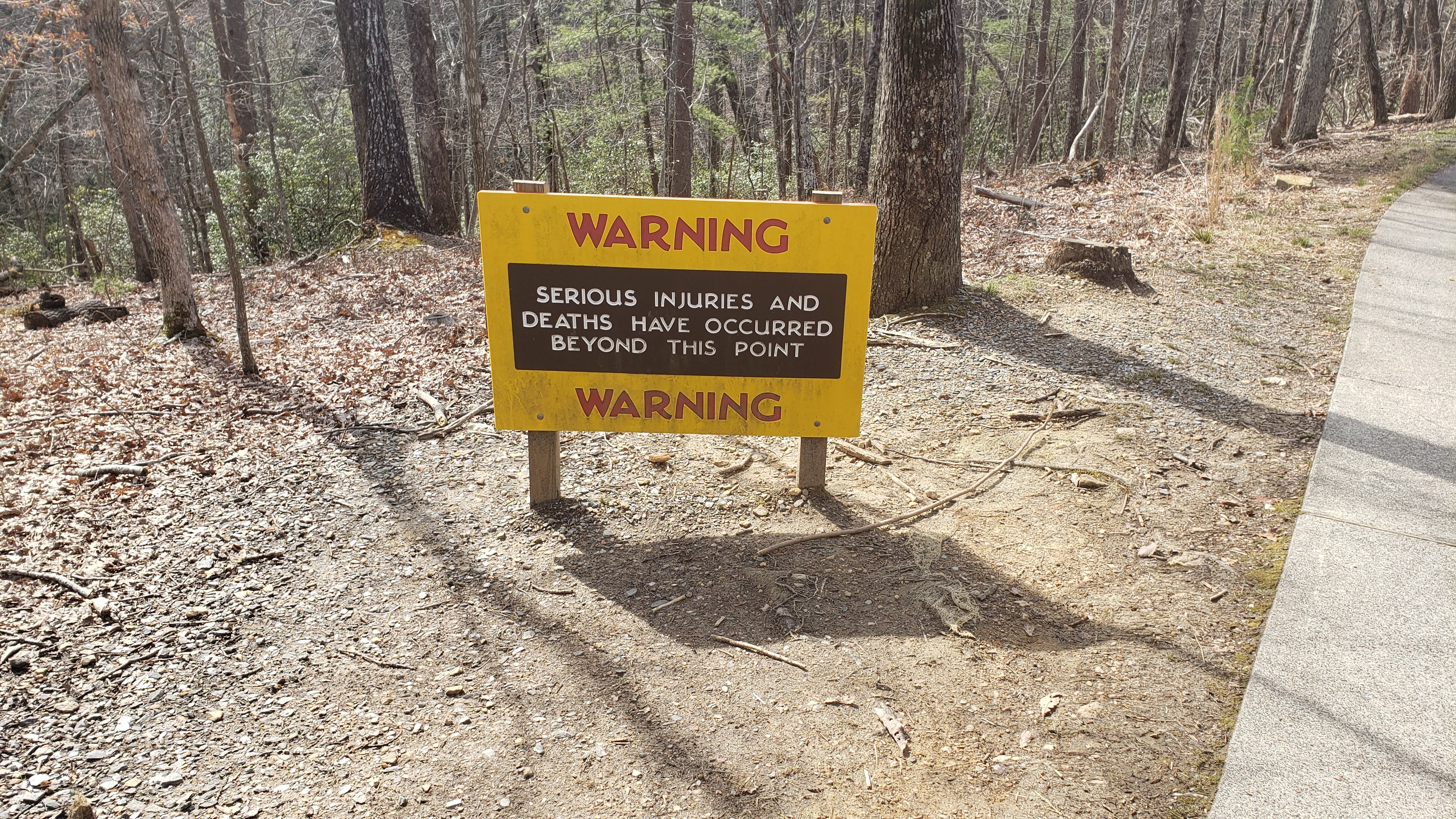 hanging rock warning sign
